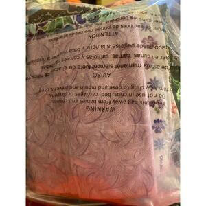 Mystery quilt fabric left at the bottom of the bin “not chosen”.